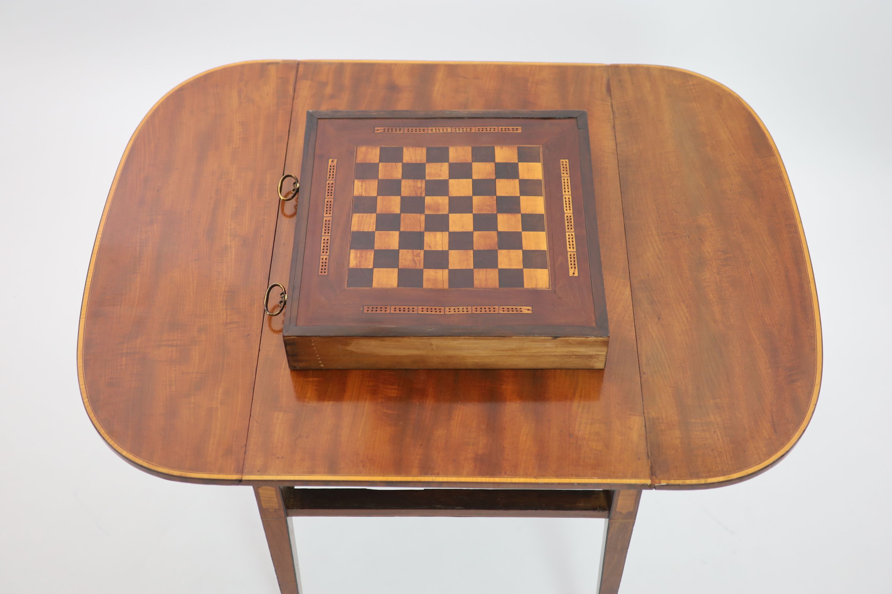 A George III satinwood banded mahogany Pembroke / games table, in the manner of Gillows of Lancaster, W.84cm D.56cm H.71cm